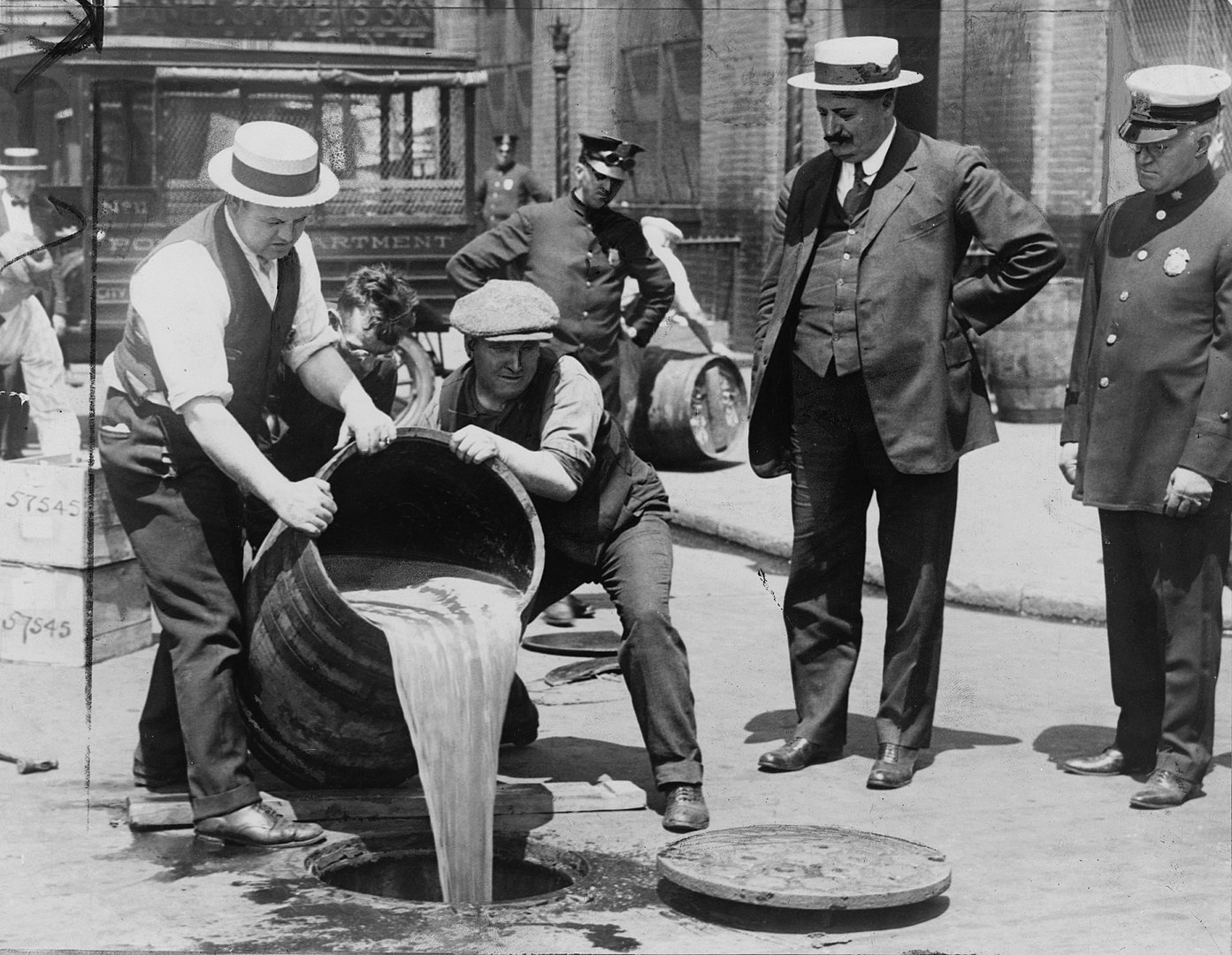 New York Police Commissioner Oversees A Liquor Pouring Exercise After A Successful Raid At The Height Of Prohibition Era  