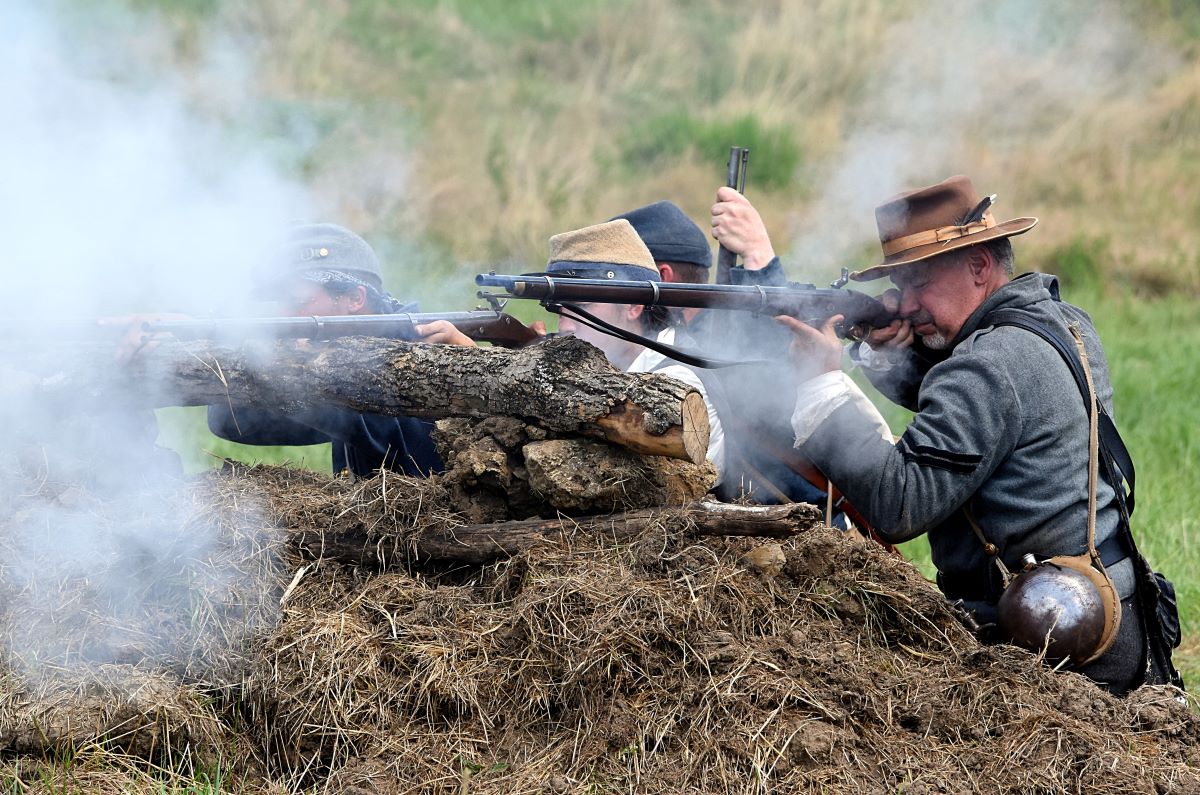 shooting a rifle in a re-enactment