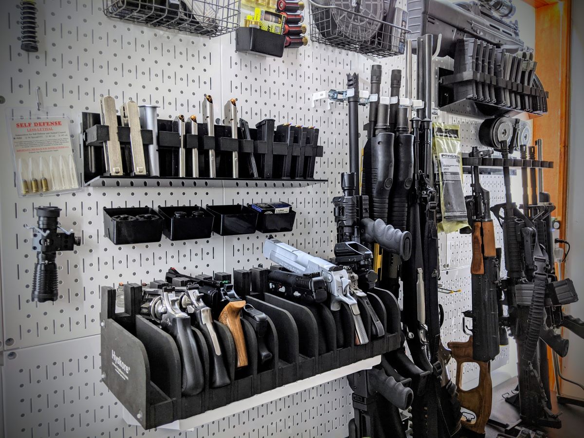 Firearms hanging in a gun closet