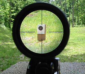 looking through a rifle scope