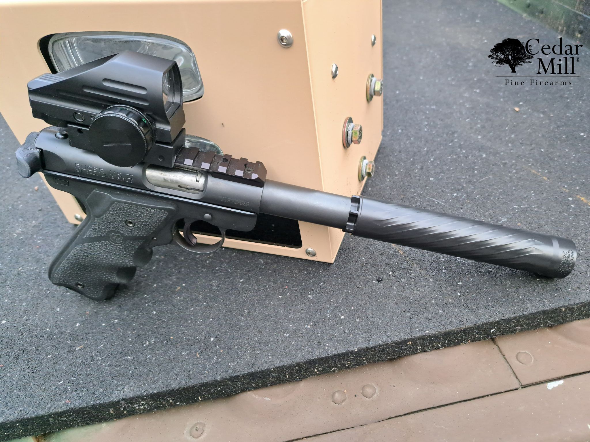 Side view of the ANECHOX .22 silencer mounted on a sleek Ruger Mark III pistol, emphasizing its compact and streamlined profile